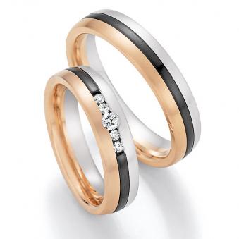 Aufnahme von Trauringen aus Rosegold & Weißgold & Zirconium mit fünf Diamanten multicolor 