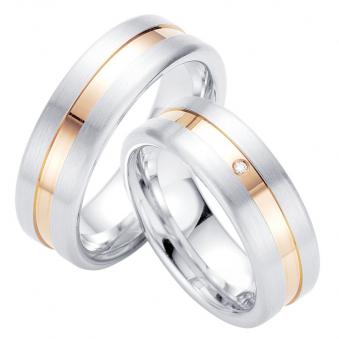 Aufnahme von Eheringen aus platiniertem Silber mattiert mit Rotgold veredeltem Streifen & Diamanten