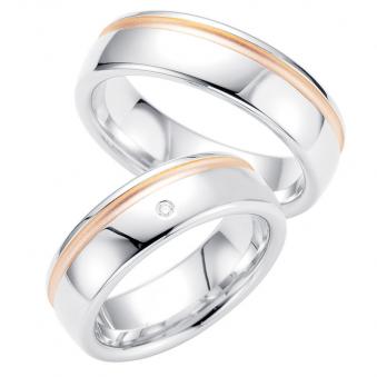 Aufnahme von Eheringen aus Silber veredelt mit Rotgold mit seitlich verlaufender Rille und Diamanten