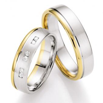 Aufnahme von Weißgold/Gelbgold Trauringen längsmatt mit sechs runden Diamanten