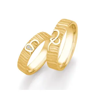Eheringe aus Gelbgold mit geriffelter Oberfläche und zwei Diamanten mit Unendlichkeitszeichen