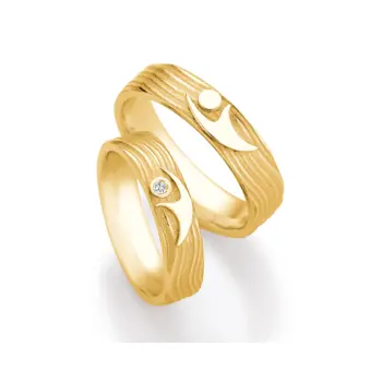 Eheringe aus Gelbgold mit interessantem Paarfigur-Symbol und Diamanten