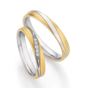 Bicolor Eheringe aus Platin mit 5 Diamanten in diagonaler Vertiefung 9255