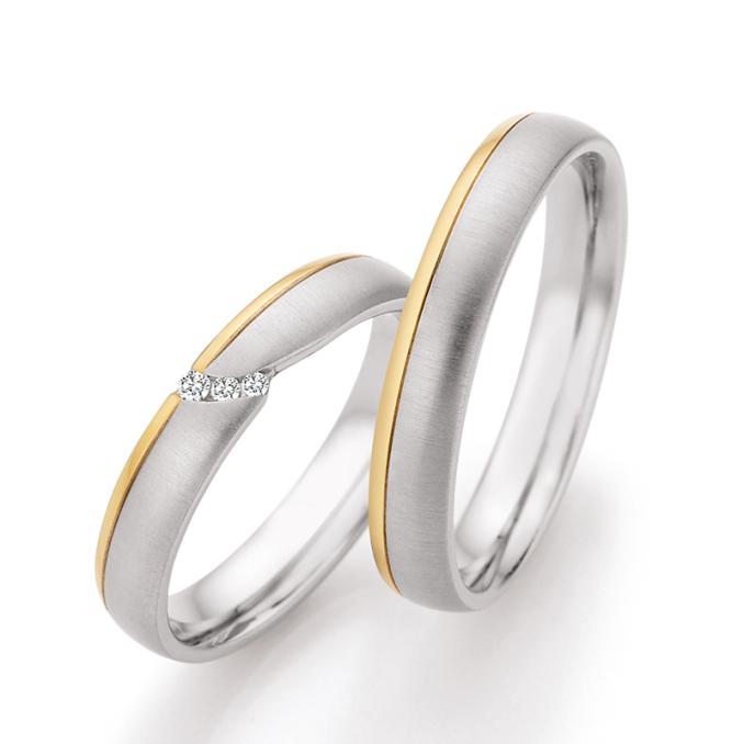 Bicolor Eheringe aus 585 Gelbgold & Platin mit 3 Diamanten in Vertiefung