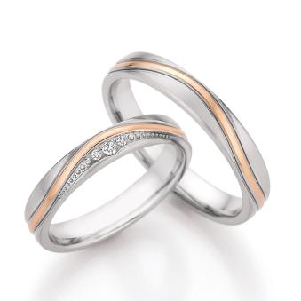 Bicolor Eheringe aus Platin mit geschwungenem Streifen aus 585 Rotgold