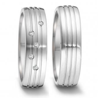 Einzigartig schöne Eheringe aus Edelstahl mit vielen Diamanten auf Rillen angeordnet 5551024