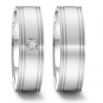 Moderne Eheringe aus Edelstahl mit Diamanten in quadratischer Umrandung 5551032
