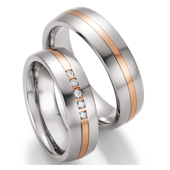 Eheringe Trauringe aus Stahl & Rotgold mit Diamant Ruesch Collection Nowotny 88/60050-060