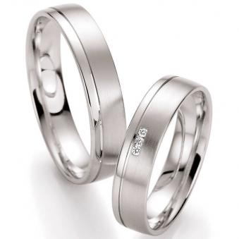 Elegante Fair Trade Weissgold Eheringe mit drei Diamanten und poliertem Rand 121028