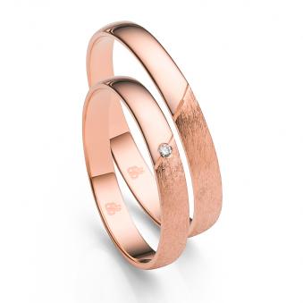 Aufnahme der Eheringe aus Roségold halbpoliert und eismattiert mit Diamanten