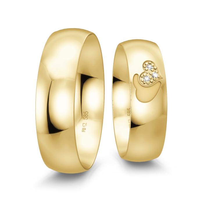 Polierte Eheringe aus Gelbgold mit Diamanten und Herzdesign im Damenring