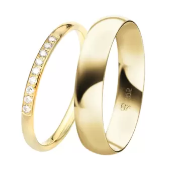 Trauringe aus Gelbgold mit breitem Herrenring und schmalem Damenring mit Labor-Diamanten