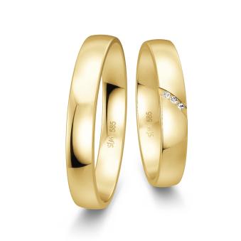 Schmale polierte Gelbgold Trauringe mit 3 Diamanten in diagonaler Kanalfassung