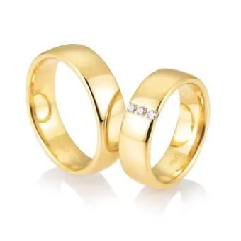 Breite 6,5 mm Gelbgold Eheringe mit Polierung und drei Diamanten