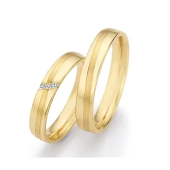 Matte und polierte Gelbold Eheringe mit Diamanten in quer verlaufender Rille