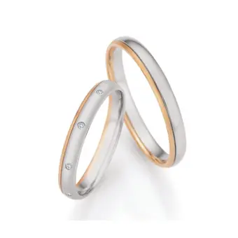 Palladium 500 und Champagne Gold Eheringe mit 9 Diamanten mattiert