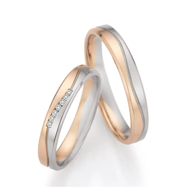 Polierte Palladium 500 und Champagne Gold Eheringe mit 7 Diamanten