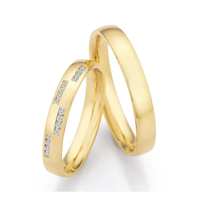 Polierte Gelbold Eheringe mit mehreren Diamantenclustern