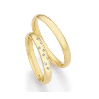 Schmale polierte Gelbold Eheringe mit Diamanten als Sternenhimmel