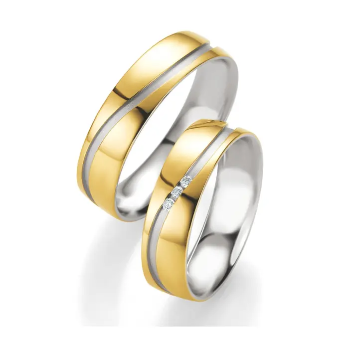 Trauringe aus Silber 925 mit mattem 585er Gelbgold und 3 Diamanten