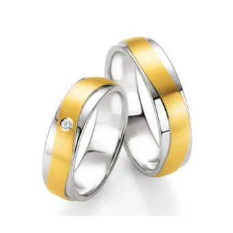 Trauringe aus Silber 925 mit 3 Diamanten und 585er Gelbgold als sandmattes Band