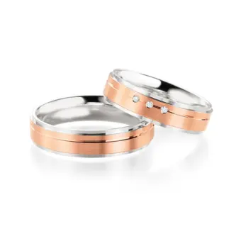 Trauringe aus poliertem Silber 925 und mattem 585er Rotgoldstreifen mit 3 Diamanten