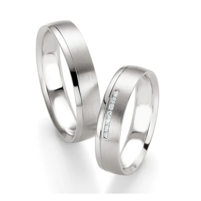 Trauringe aus Silber 925 und 585er Weißgold mit Diamanten