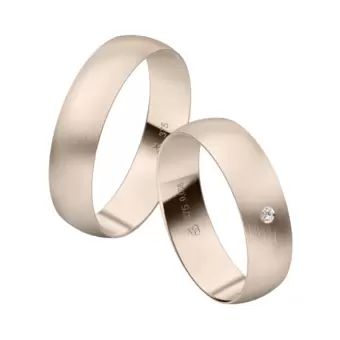 Mattierte Eheringe aus Herbstgold mit 0,01 Karat Diamanten