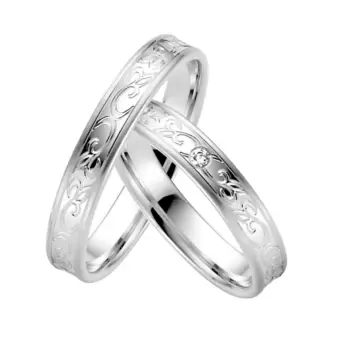 Konkave Eheringe Plagentum mit floralem Muster und 0,02 Karat Diamanten