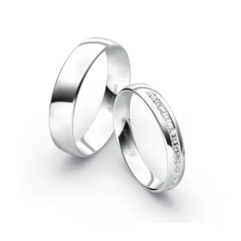 Plagentum Eheringe poliert in zwei Breiten mit 16 Diamanten im Damenring