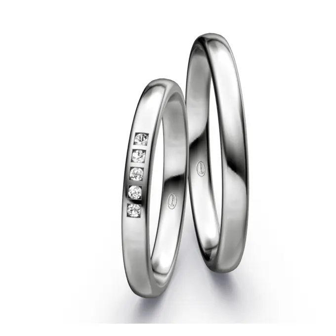 Platin Eheringe mit 5 weißen Diamanten in polierter Oberfläche