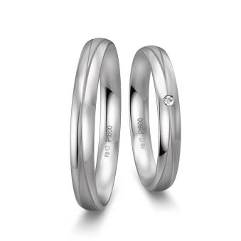 Schmale Trauringe aus Platin mit Diamant und Rillen