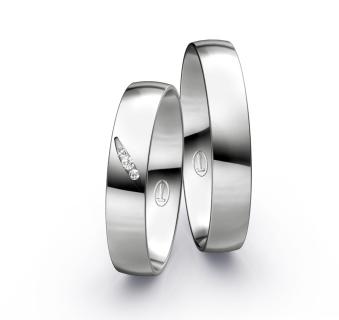 Trauringe aus poliertem Platin mit Kanalfassung in Tropfenform mit 3 Diamanten