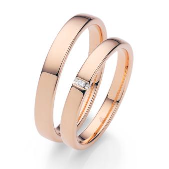 Roségold Eheringe mit polierter Oberfläche und Diamanten