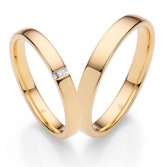 Eheringe aus poliertem Sommergold und Diamanten