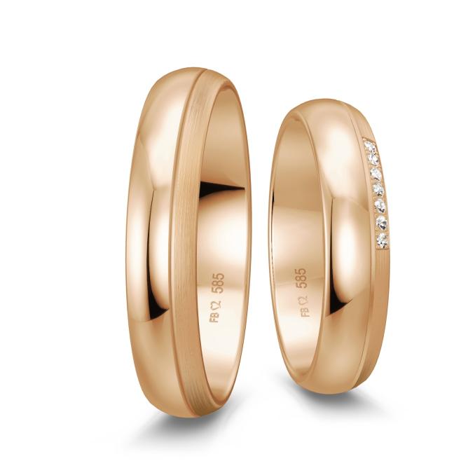 Gerundete Trauringe aus Roségold mit 7 Diamanten, Polierung und Mattierung