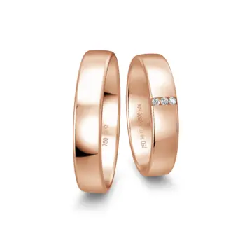 Rotgold Eheringe in polierter Gestaltung mit drei Diamanten je 0,01 Karat