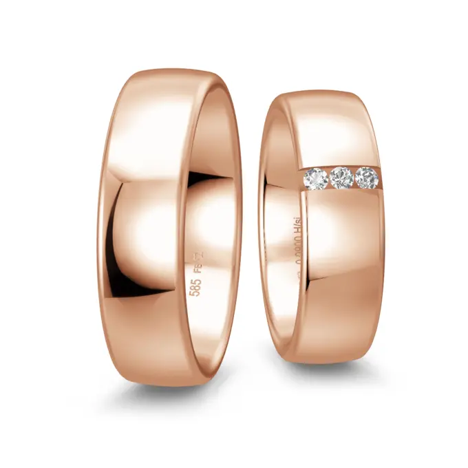 Rotgold Eheringe 6,5 mm breit poliert mit drei Diamanten