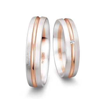 Weissgold Trauringe mit polierter Rotgold Fuge und Diamant