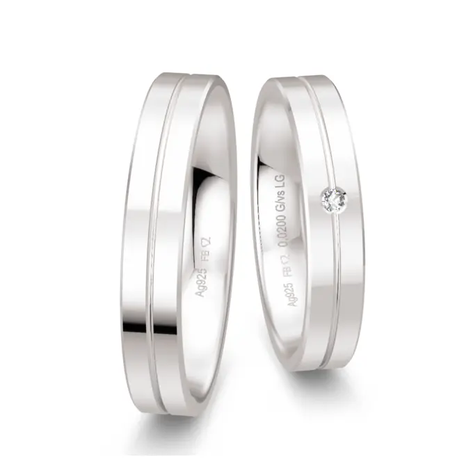 Trauringe aus glänzendem Silber mit feiner Rille und Labor Diamant