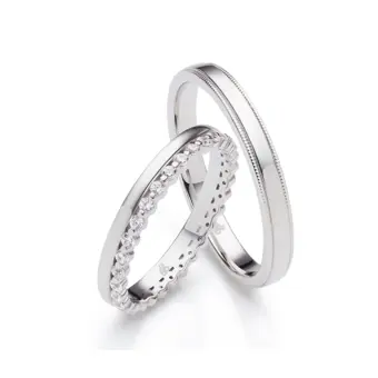 Polierte Eheringe aus rhodiniertem Silber 925 mit Zirkoniaband