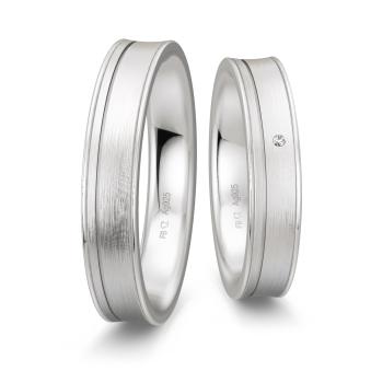 Eheringe aus platiniertem 925 Silber konkavförmig mit polierten Rillen und Diamanten
