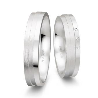 Trauringe aus Silber 925 platiniert mit drei Diamanten und Streifenmuster