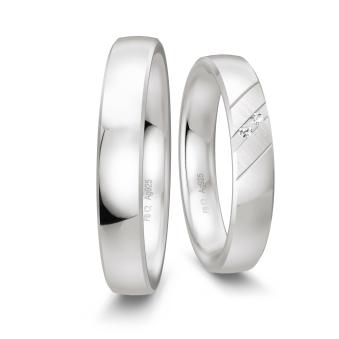 Eheringe aus platiniertem 925 Silber mit zwei Diamanten und schrägen Rillen