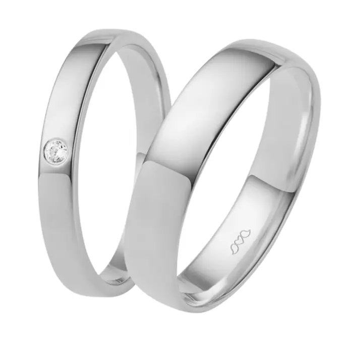 Feine Eheringe aus rhodiniertem Silber 925 mit 3 Zirkonia in elegant polierter Gestaltung
