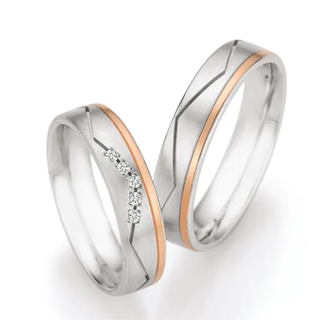 Silber & Rotgold Trauringe matt mit 5 Diamanten und Rille