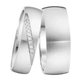 Gerundete matte Edelstahl Eheringe in zwei Breiten mit 9 Diamanten