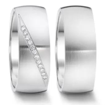8 mm breite Edelstahl Eheringe mit 9 schräg angeordneten Diamanten längsmattiert