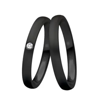 Trauringe aus schwarzem mattem Stahl mit weißen Diamanten 0,025 Karat