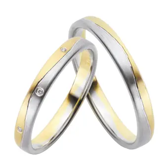 Gelb-&Weissgold Eheringe mit Längsmattierung und drei Diamanten
